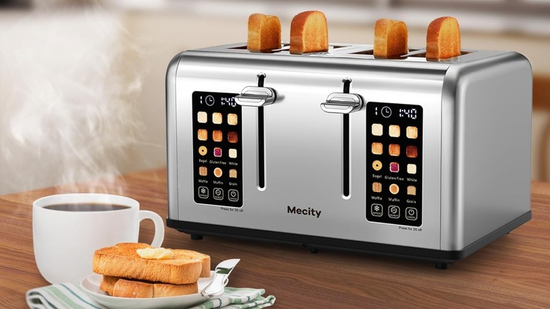 A Mecity toaster with four pieces of toast