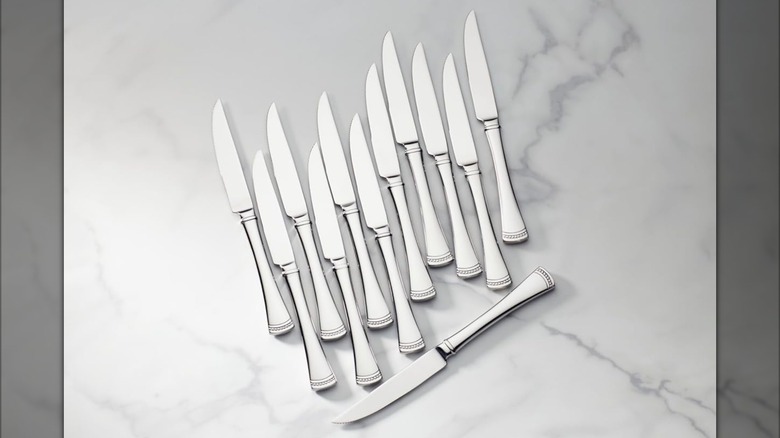 Lenox Portola 12-Piece Steak Knife Set on a marble counter