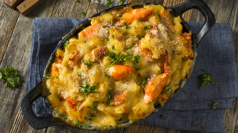 Mac and cheese in a skillet with lobster