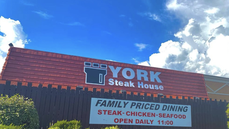 York Steak House sign and fence