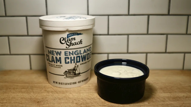 A container of Blount Clam Shack New England Clam Chowder next to a full bowl