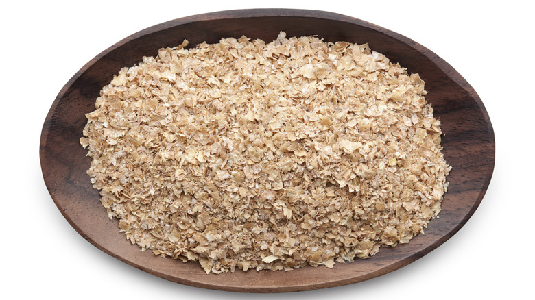 wheat bran in wood bowl