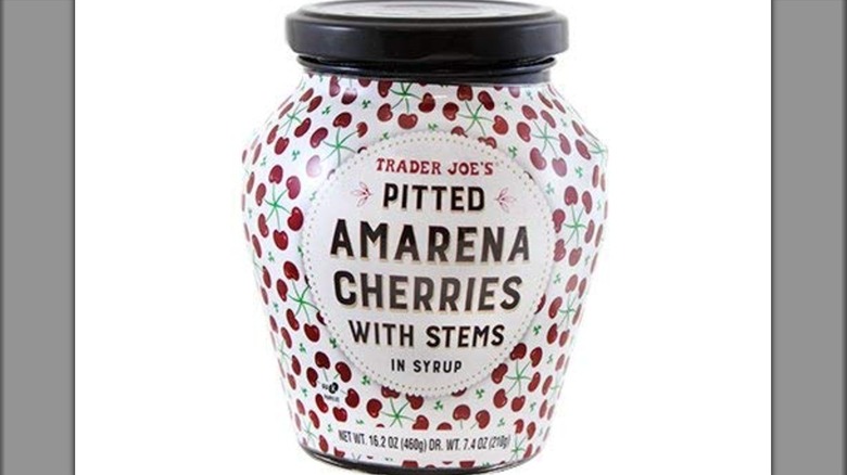 A jar of Trader Joe's Pitted Amarena Cherries with Stems in Syrup
