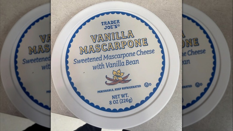 A tub of Trader Joe's Vanilla Mascarpone sits on a counter.