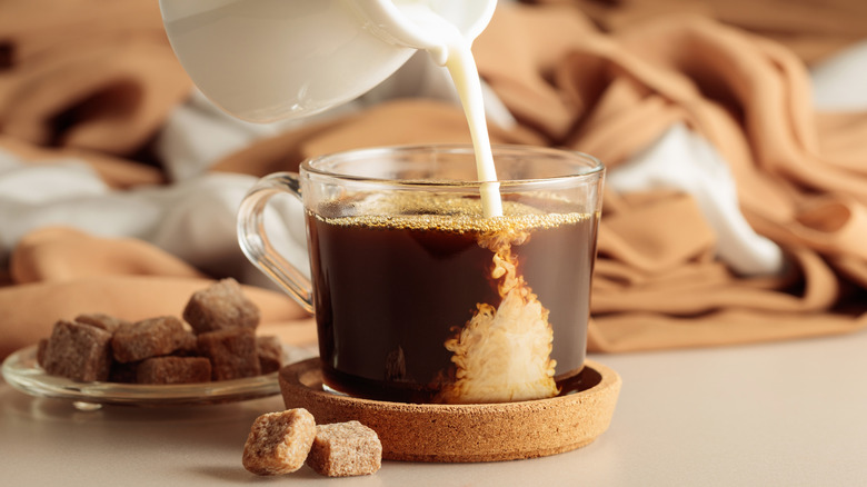 person making coffee
