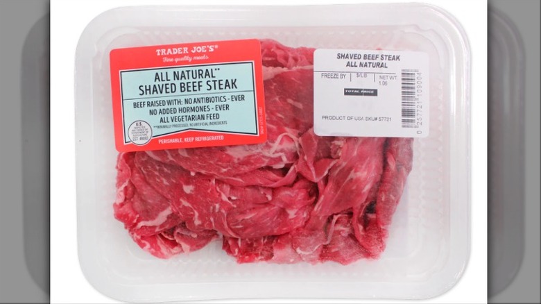 Shaved beef steak product on white background