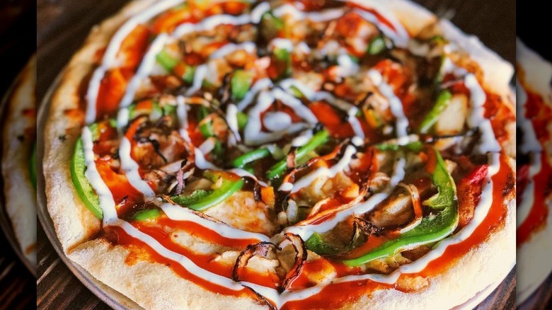 Pizza with vegetables and sauce