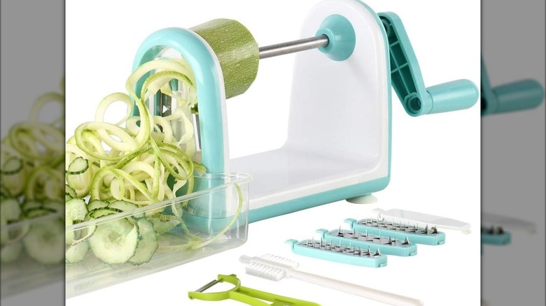 An Ourokhome veggie spiralizer slicing a zucchini