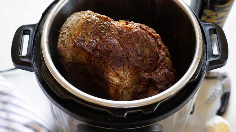 Prime rib cooking in an Instant Pot