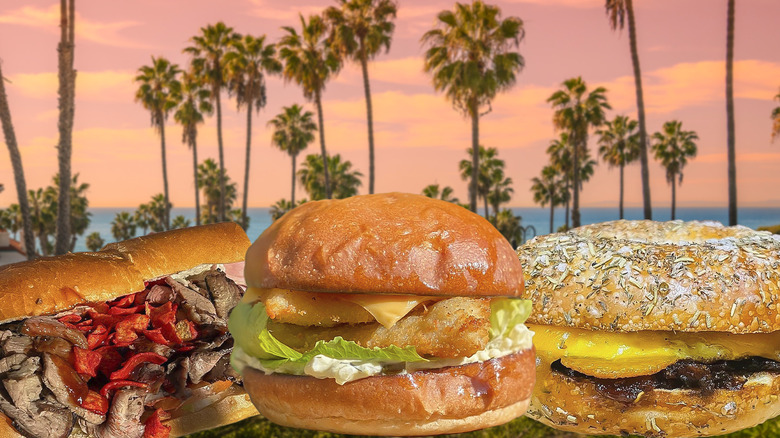three sandwiches with sunset and palm trees