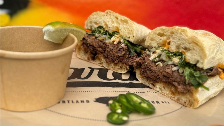 Pho'Rench dip cut in half with dipping sauce