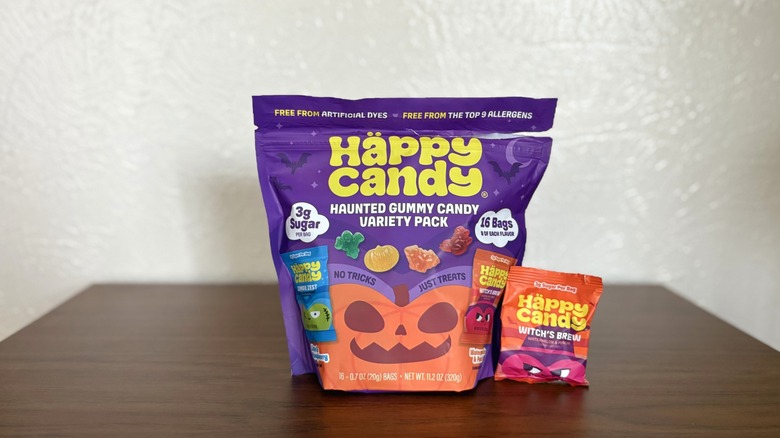 Häppy Candy Halloween variety pack next to a smaller bag of Witch's Brew