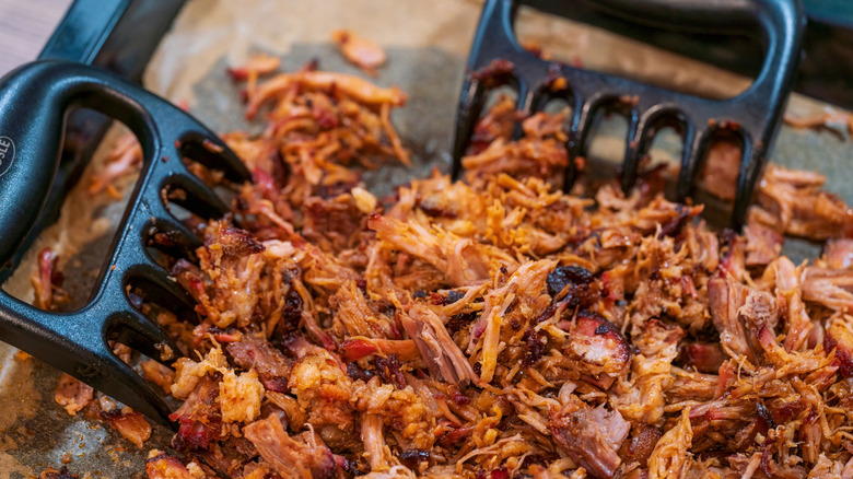 succulent and flavorsome pulled pork shredded by bear claws