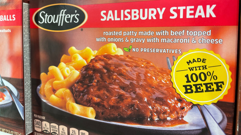 Close up of boxed Salisbury steak meal on grocery store shelf