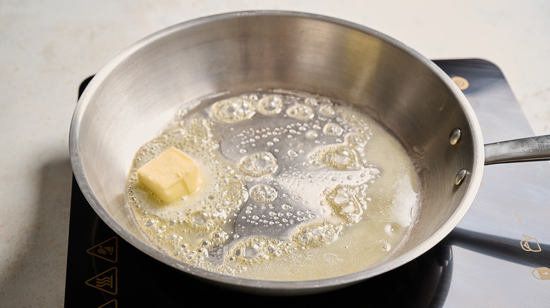 melting butter in a skillet