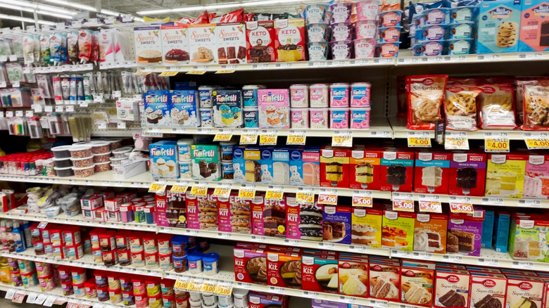 supermarket shelf full of cake mixes