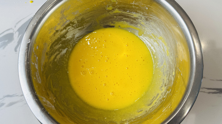 Yolks whisked in bowl