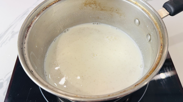 Milk heating in pot