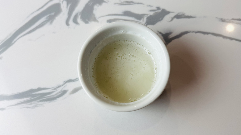 Dissolved gelatin mixture in ramekin