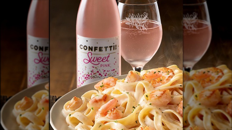 Confetti moscato bottle with pasta dish
