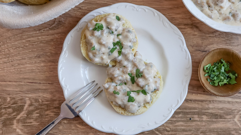 biscuits and herb gravy on plate