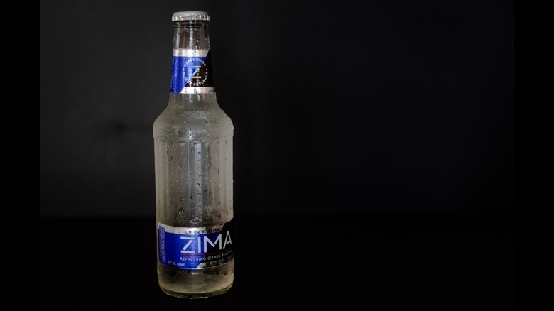 Bottle of Zima on a black background