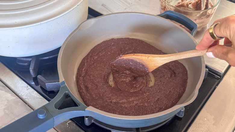 Black bean puree in pan
