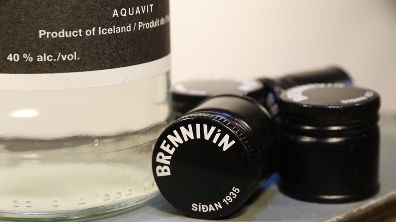 A bottle of brennivín and caps