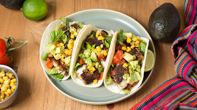 blackened fish tacos on table