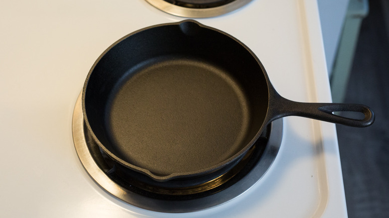 empty cast iron pan on stove