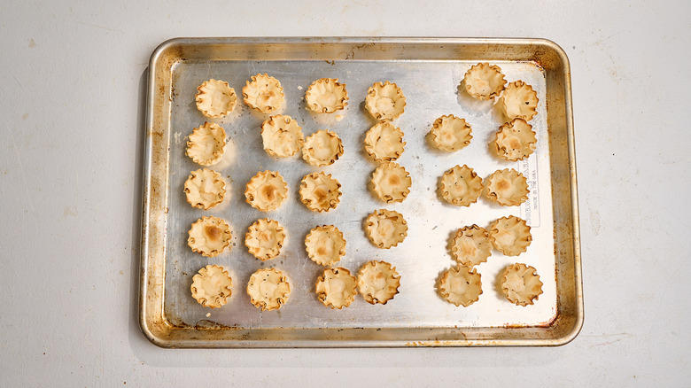 baked phyllo cups on a sheet tray