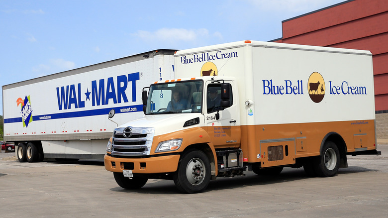 A Blue Bell ice cream truck delivering to a Walmart