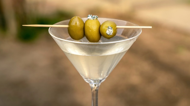 Martini garnished with blue cheese-stuffed olives