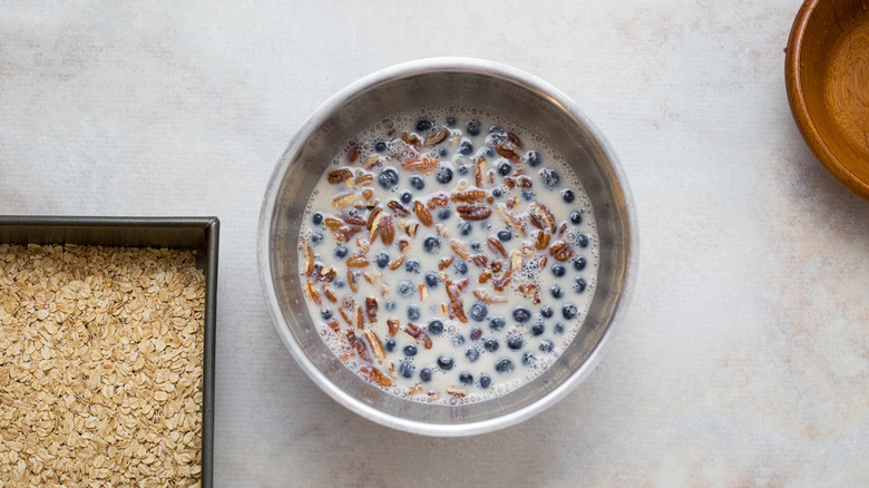 milk and fruit in bowl