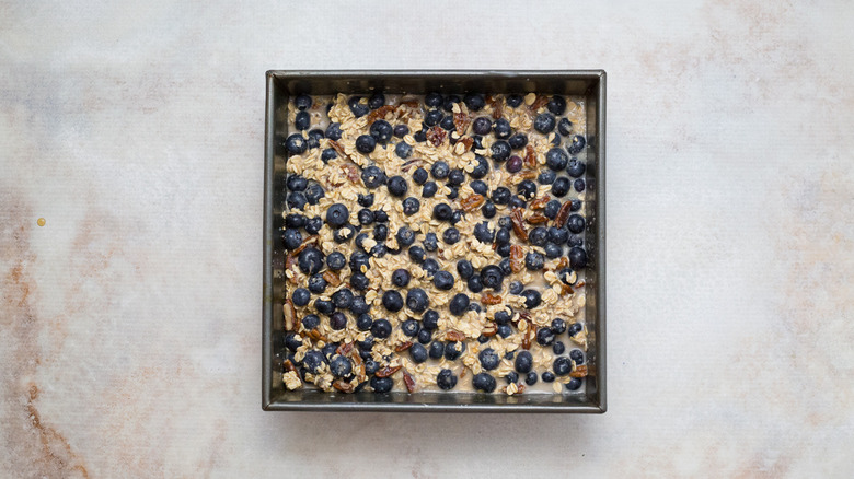 uncooked oat mixture in pan