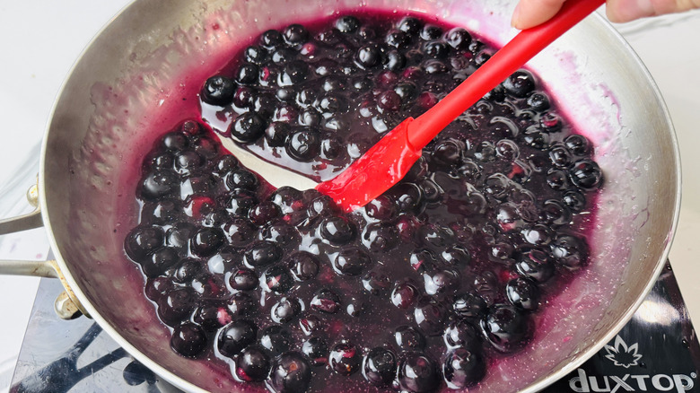 Blueberry topping cooking in saucepan