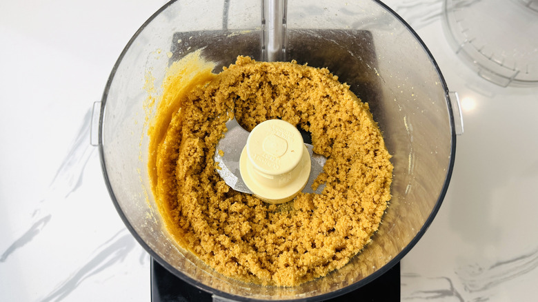 Cheesecake crust ingredients in food processor
