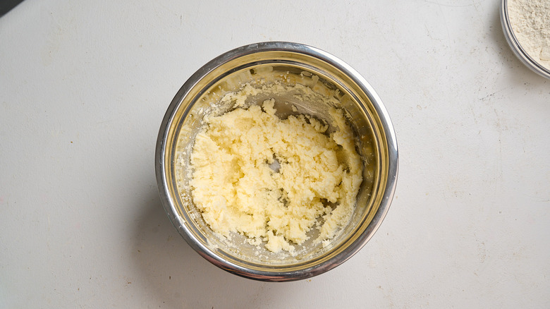 creaming butter and sugar together in a bowl