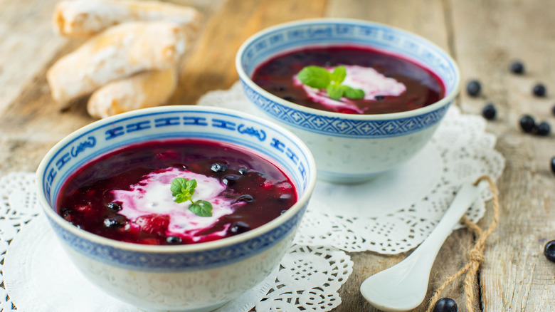 Bowls of blueberry soup