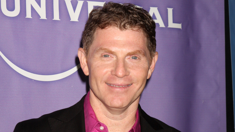 Bobby Flay smiling at event