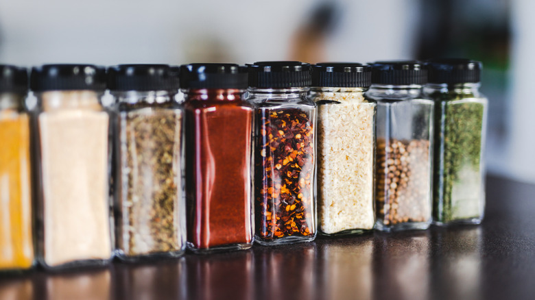 Row of spice jars on counter