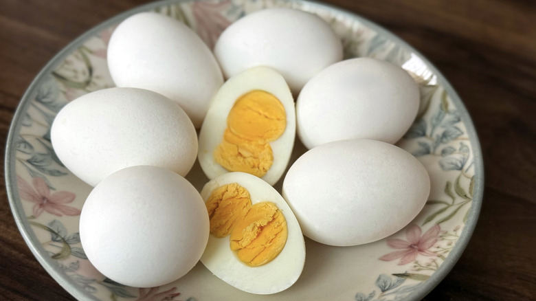 A plate of halved hard-boiled eggs