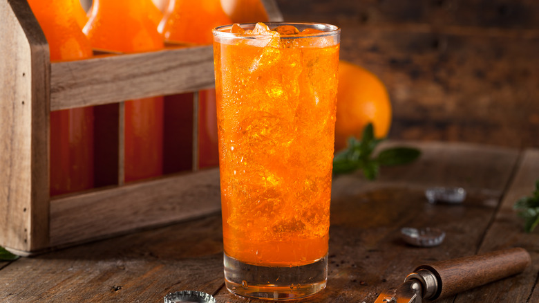 orange kool-aid drink in glass