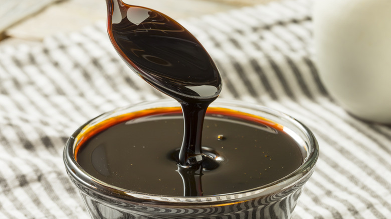 black molasses in a glass container