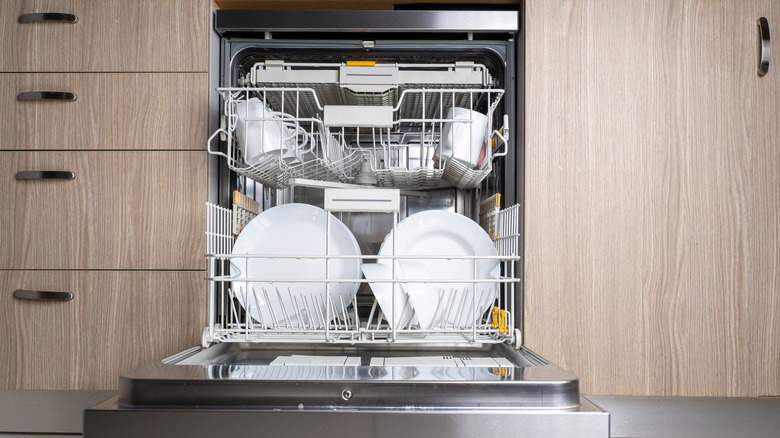 build-in dishwasher loaded with white dishes