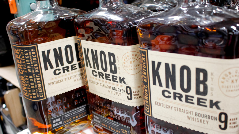 Bottles of Knob Creek 9 Year Bourbon on a shelf