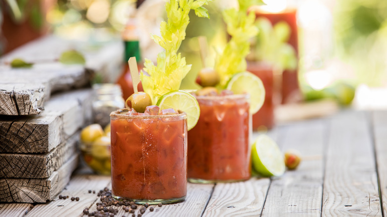 Bloody Mary cocktails with celery garnish