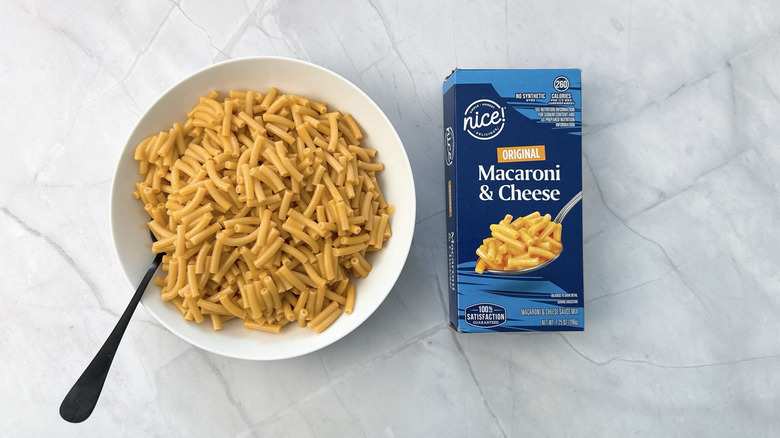 bowl of macaroni and cheese and box from Nice