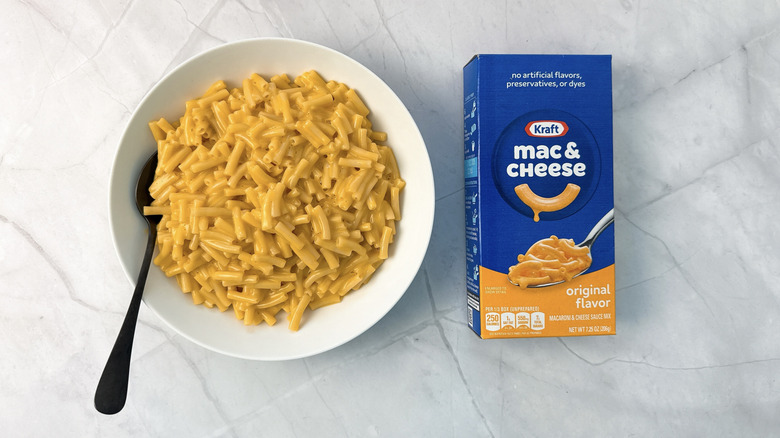 bowl of macaroni and cheese and box from Kraft
