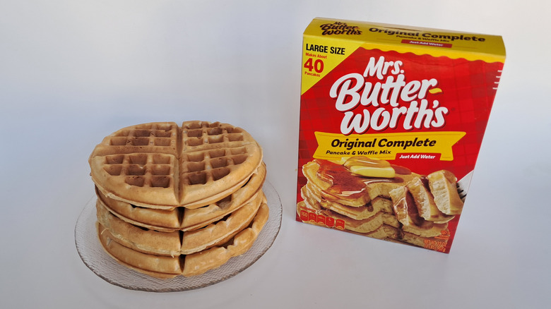 Stack of waffles beside box
